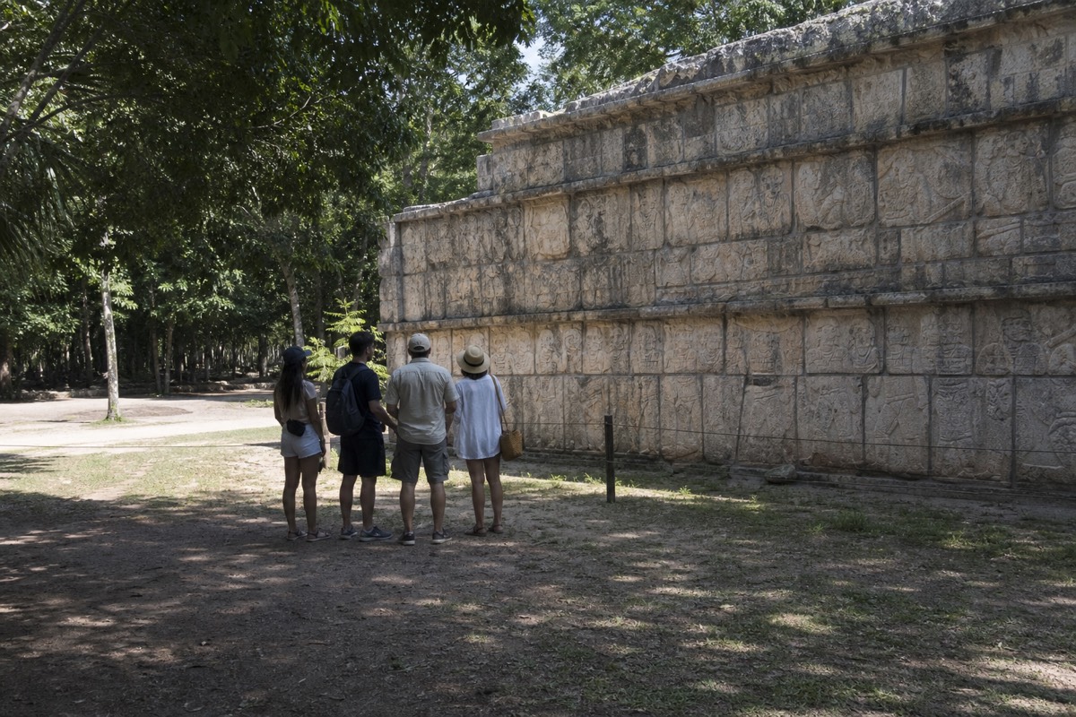 A private guide sharing the history of Chichen Itza