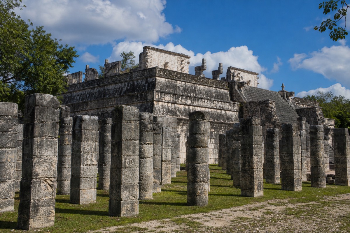The Temple of the Warriors at Chichen Itza with its rows of carved columns, part of a full private tour walk